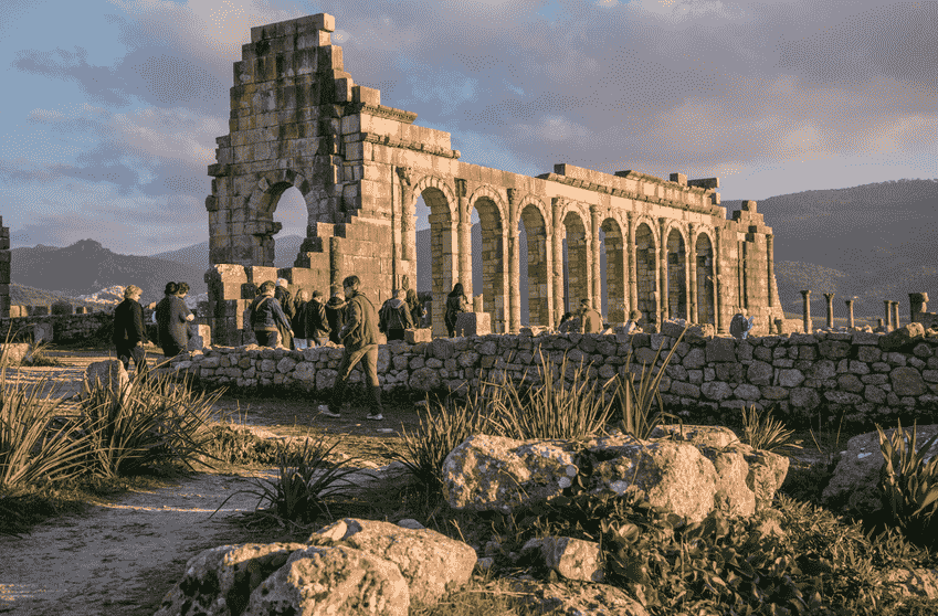 Archaeological site at Volubilis showcasing ancient Roman ruins and historical artifacts.